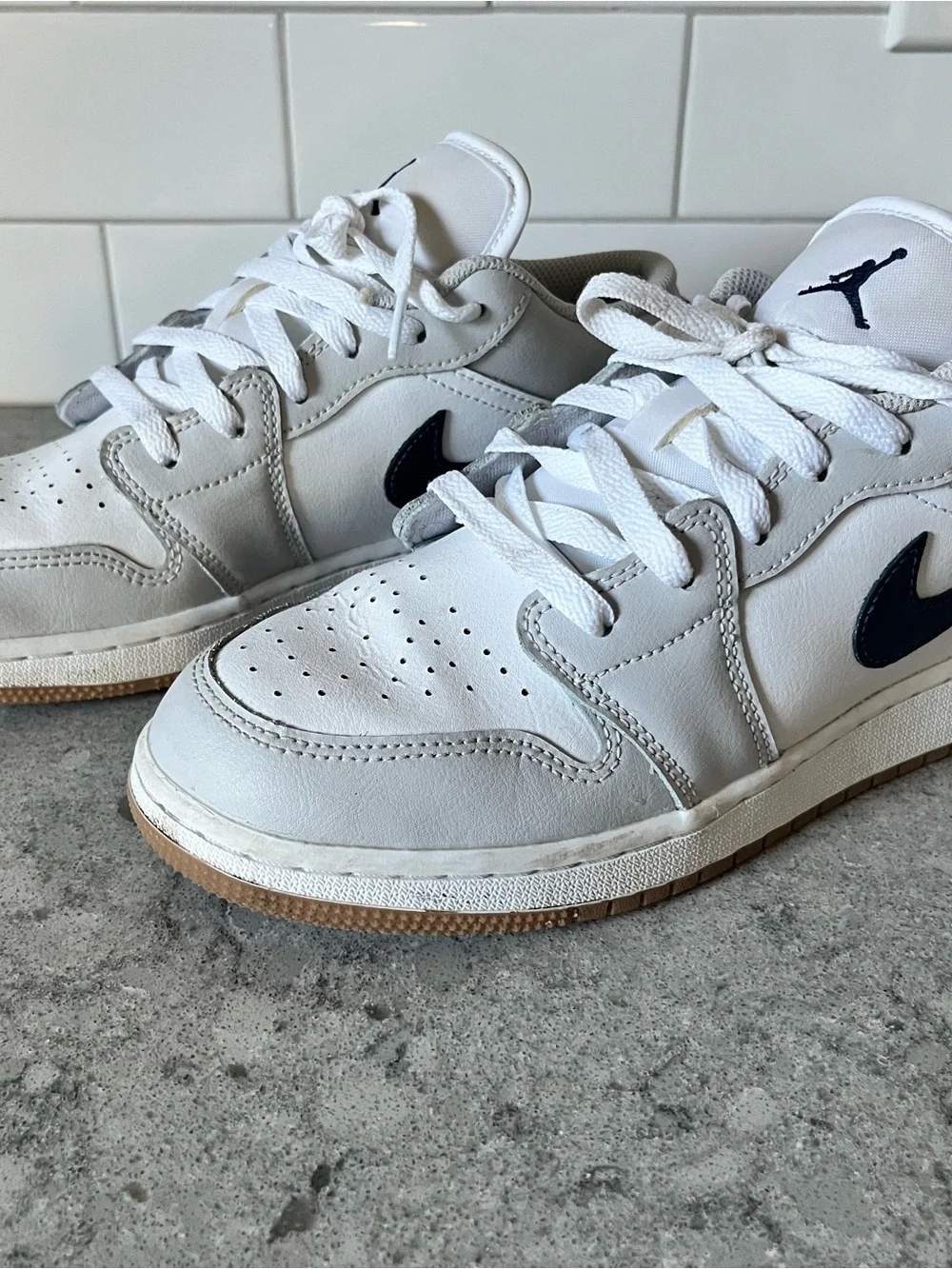 Nike Kids White Sneakers with navy Swoosh